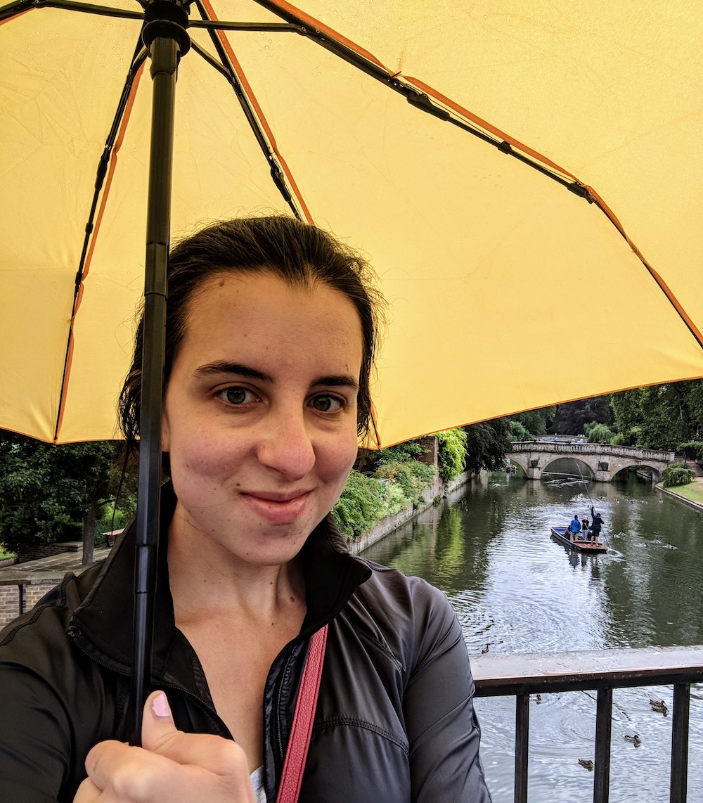 Sara with an umbrella